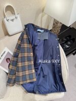 PRADA 2024 Autumn/Winter New Collection   Classic plaid shirt design with 100 wool plaid fabric and inverted triangle collar  Badge logo cotton jacket - Image 20
