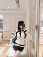 The heiress of the Chanel conglomerate ”  New collection for autumn and winter season 24: Black and white color matching elegant temperament lace up bow pullover wool sweater. - Image 4