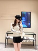 Chanel's ""Fashion for Study Abroad Women"" Autumn/Winter Collection for Season 24   Heavy industry bead cuff round neck wool pullover sweater for women. - Image 5