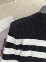 BALMAIN2024ss Early Autumn New Collection  High Version Classic Black and White Striped Metal Buckle VNeck Padded Shoulder Knitted Cardigan Coat for Women. - Image 9
