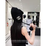 Chanel 2025B Fall/Winter Collection 🤍 Pom-Pom Beanie w/ Drop Pendant - Imported Cashmere Earflap Hat (Russian-Style Knit) - Image 10