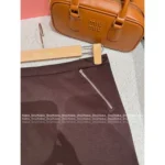 miumiu 2025SS Early Fall Collection 🤎 Maillard Color-Block Hoodie - Zip-Up Notch Collar Pullover & Brown Knit Skirt - Image 10