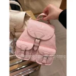 Louis Vuitton  Strawberry Mousse Pink 🎀 2025SS Classic Four-Leaf Clover Print Duma Backpack - Genuine Leather Mini Bookbag