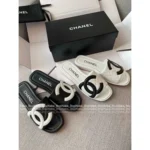 Chanel 2025A Black & White Contrast Slides 🐼 Oversized Logo Slip-On Sandals - Vintage Compagnie Style