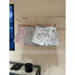 Chanel 2025M CoCo Beach Resort Collection 💗 Print Logo High-Waisted Denim Shorts - Slimming Cut w/ Pockets - Image 7