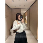 Louis Vuitton 2025SS Early Fall Collection 🤍 Women's White Shirt with Leather Trim - Genuine Leather Collar & Metal Button Details - Image 11
