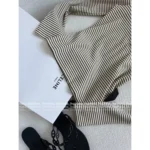 Celine 2025SS Early Fall Collection 🔍 Black & White Contrast Knit Top - Slim-Fit Round Neck w/ Metal Logo Buttons - Image 6