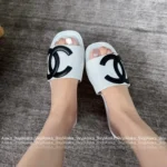 Chanel 2025A Black & White Contrast Slides 🐼 Oversized Logo Slip-On Sandals - Vintage Compagnie Style - Image 4