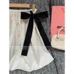 miumiu 2025SS Spring/Summer Collection 🎀 Embossed Jacquard Blouse & Bow-Back Skirt Set - Notch Collar Shirt with 3D Logo & Tiered Bustle Skirt - Image 15