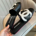 Chanel 2025A Black & White Contrast Slides 🐼 Oversized Logo Slip-On Sandals - Vintage Compagnie Style - Image 2