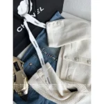Chanel 2025A Early Spring Collection 🌸 Runway Chunky Knit Cardigan - Cropped Cream Cable Knit w/ Pockets - Image 10