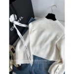 Chanel 2025A Early Spring Collection 🌸 Runway Chunky Knit Cardigan - Cropped Cream Cable Knit w/ Pockets - Image 7