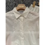 miumiu 2025SS Spring/Summer Collection 🎀 Embossed Jacquard Blouse & Bow-Back Skirt Set - Notch Collar Shirt with 3D Logo & Tiered Bustle Skirt - Image 10
