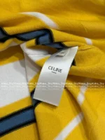 Celine 2025SS Spring/Summer Collection 🍋 American Retro "Spicy Girl" Top - Color-Block Oversized Shirt with Embroidered Logo - Image 16