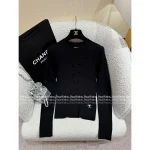 Chanel 2025 Early Fall Collection 🤍 Round Neck Frog Button Embroidery 3D Logo Ribbed Long Sleeve Knit Top - Image 11