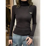 Prada 2025 Early Fall/Winter Collection ▶️ Classic Triangle Badge Logo Mock Neck Slim-Fit Wool Knit Pullover for Women