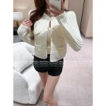 Chanel French Elegance & Heiress Style 🤍 2025 Early Fall/Winter Collection Artisan Chunky Knit Pearl Button Cardigan for Women - Image 9